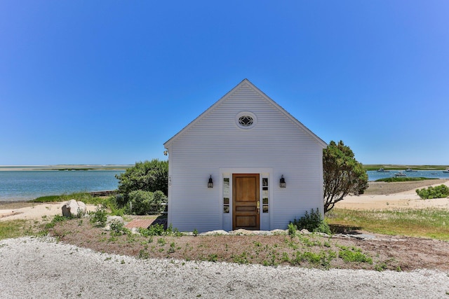 view of outbuilding with a water view