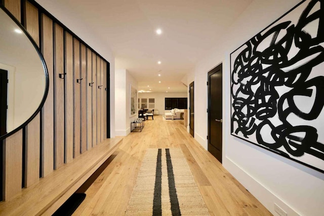 corridor featuring light hardwood / wood-style floors