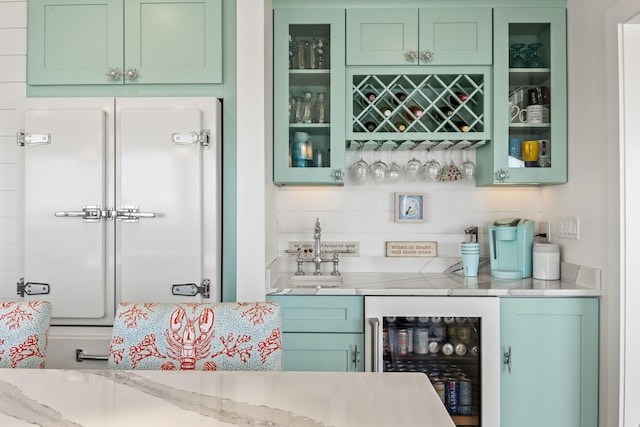 494 Shore Rd, North Truro, MA 02652 - bar with wet bar, a sink, and wine cooler