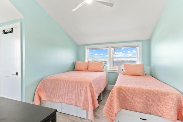 494 Shore Rd, North Truro, MA 02652 - bedroom featuring vaulted ceiling, ceiling fan, and light wood-style flooring