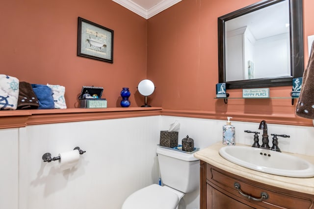 480 Forest Rd, South Yarmouth, MA 02664 - half bathroom with crown molding, vanity, and a decorative wall