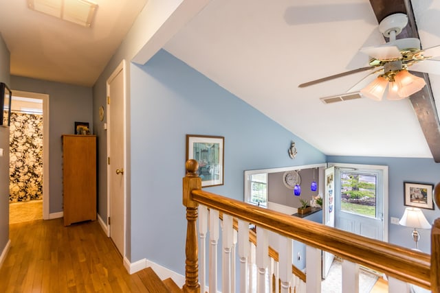480 Forest Rd, South Yarmouth, MA 02664 - corridor featuring an upstairs landing, wood finished floors, and vaulted ceiling