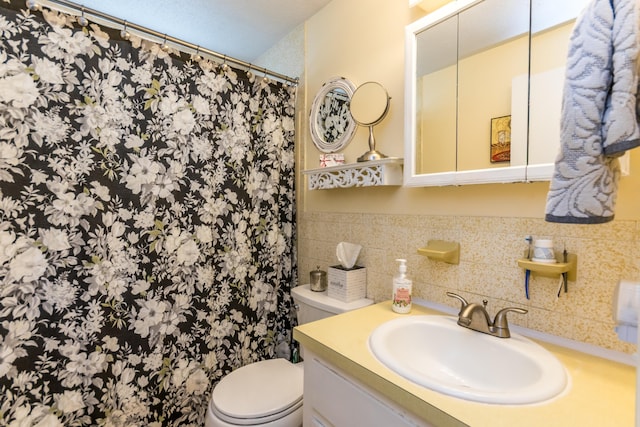 480 Forest Rd, South Yarmouth, MA 02664 - bathroom featuring vanity, curtained shower, and backsplash