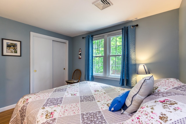 480 Forest Rd, South Yarmouth, MA 02664 - bedroom with a closet and wood finished floors