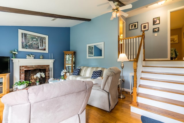 480 Forest Rd, South Yarmouth, MA 02664 - living area featuring wood finished floors, ceiling fan, stairway, and a brick fireplace