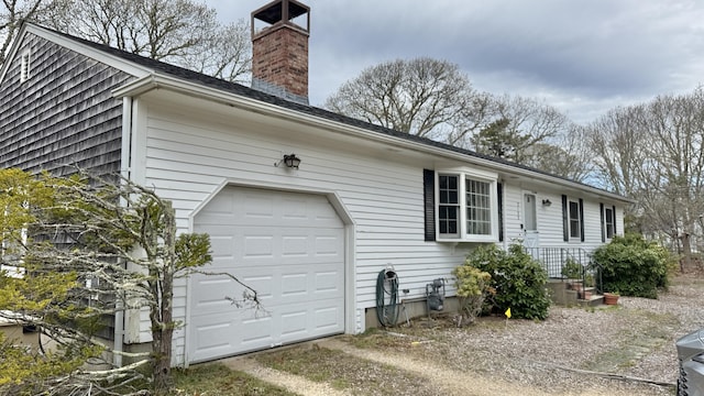 view of home's exterior with a chimney