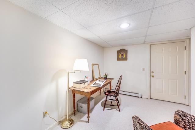 carpeted office featuring baseboards, a drop ceiling, and baseboard heating