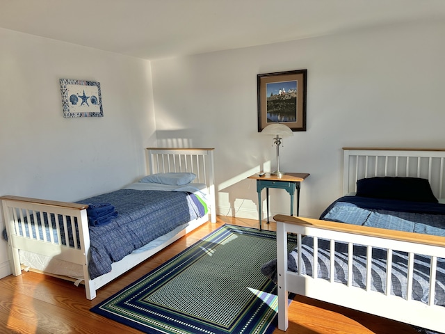 bedroom featuring hardwood / wood-style floors