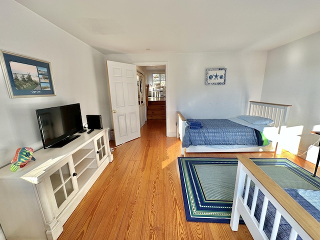 bedroom with light hardwood / wood-style floors