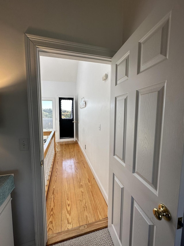 corridor featuring light hardwood / wood-style flooring