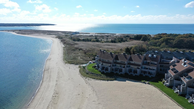 bird's eye view featuring a water view and a view of the beach