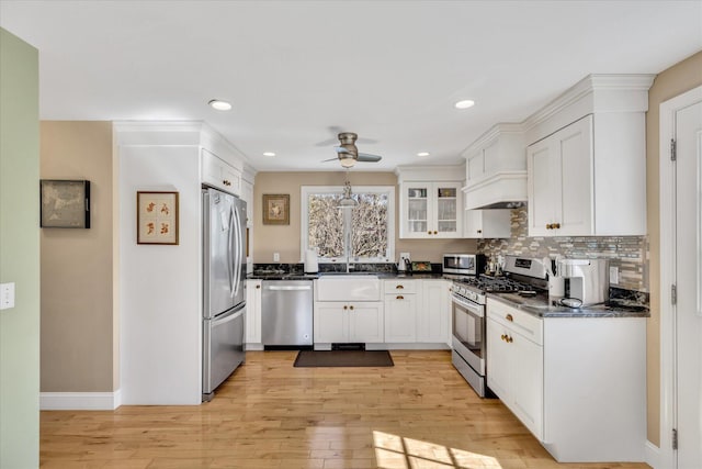 51 Buccaneer Way, Mashpee, MA 02649 - kitchen with appliances with stainless steel finishes, dark countertops, ceiling fan, white cabinets, and recessed lighting