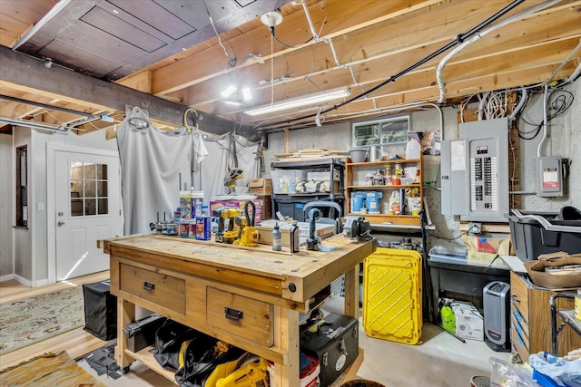 51 Buccaneer Way, Mashpee, MA 02649 - unfinished basement with electric panel and a workshop area