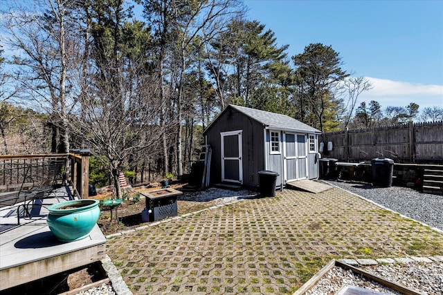 51 Buccaneer Way, Mashpee, MA 02649 - view of yard featuring a storage unit and a fire pit