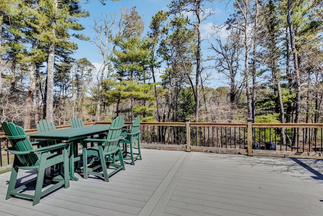 51 Buccaneer Way, Mashpee, MA 02649 - deck with outdoor dining area and view of scattered trees