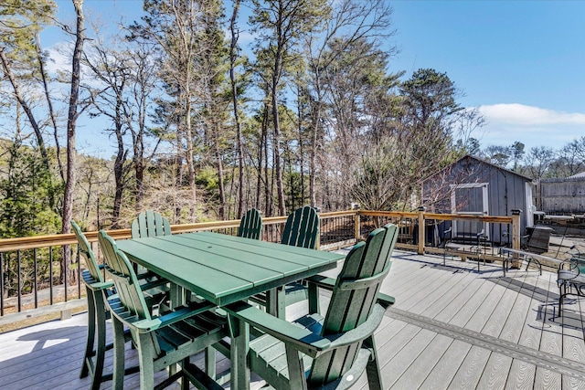 51 Buccaneer Way, Mashpee, MA 02649 - deck with outdoor dining area and a shed