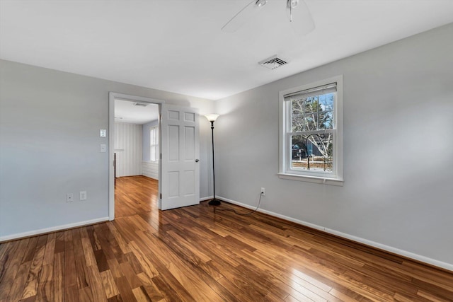 unfurnished bedroom with hardwood / wood-style floors and ceiling fan