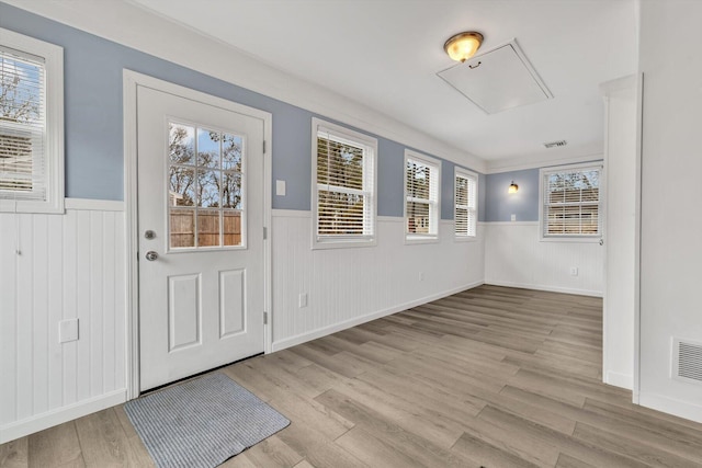 foyer entrance featuring light hardwood / wood-style flooring