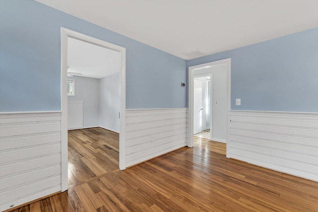 empty room featuring hardwood / wood-style floors