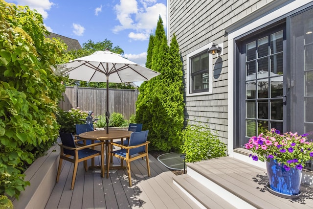 4 Race Rd Unit U2, Provincetown, MA 02657 - wooden deck featuring outdoor dining area