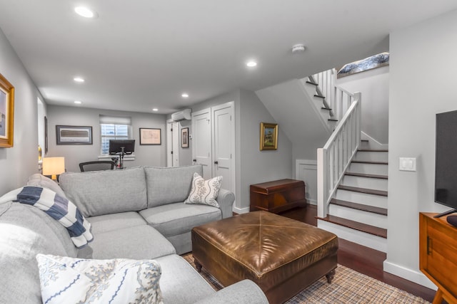 4 Race Rd Unit U2, Provincetown, MA 02657 - living room with recessed lighting, stairway, a wall mounted AC, and wood finished floors
