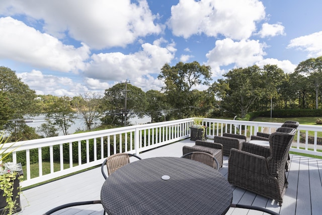 wooden deck with outdoor lounge area