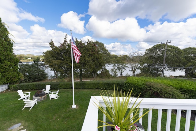 view of yard with a fire pit