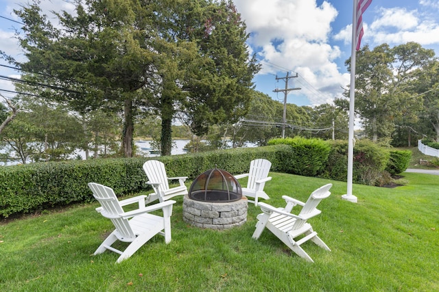 view of yard featuring a fire pit