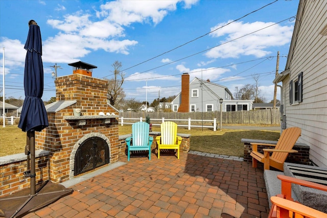 138 Sea St Unit 6, Dennis Port, MA 02639 - view of patio / terrace with a fireplace