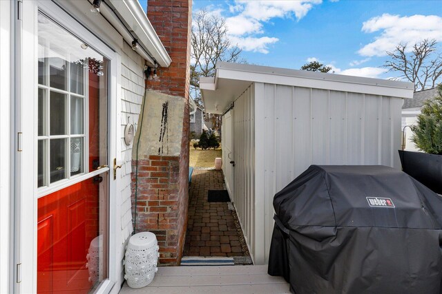 138 Sea St Unit 6, Dennis Port, MA 02639 - view of side of property featuring a chimney