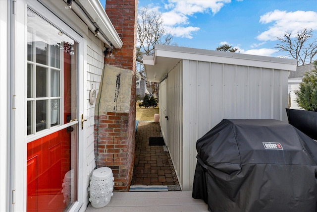 138 Sea St Unit 6, Dennis Port, MA 02639 - view of home's exterior featuring a chimney