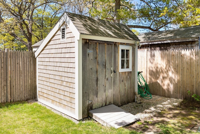 19 Anthony Rd, West Yarmouth, MA 02673 - view of shed featuring a fenced backyard