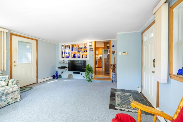 19 Anthony Rd, West Yarmouth, MA 02673 - carpeted living area with a baseboard radiator
