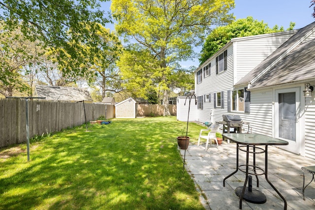 19 Anthony Rd, West Yarmouth, MA 02673 - view of yard featuring a shed, an outdoor structure, and a patio
