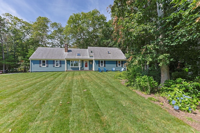 11 Cross Hill Rd, Forestdale, MA 02644 - view of front facade featuring a chimney and a front yard
