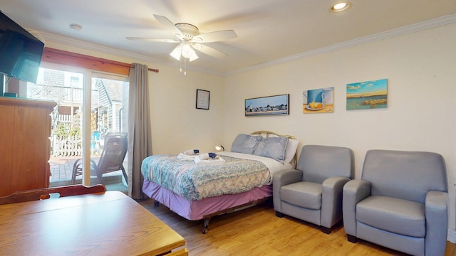 bedroom with a ceiling fan, light wood-style flooring, ornamental molding, and access to exterior
