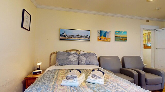 bedroom featuring ornamental molding