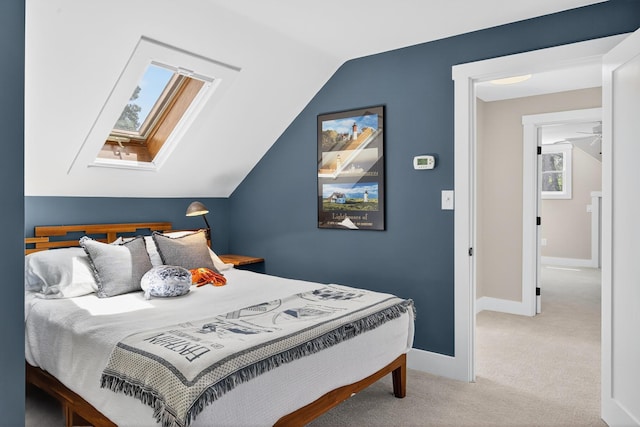 44 Squirrel, Eastham, MA 02642 - bedroom featuring a skylight, carpet flooring, and vaulted ceiling