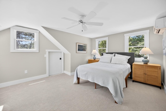 44 Squirrel, Eastham, MA 02642 - bedroom featuring a wall mounted air conditioner, light carpet, ceiling fan, and vaulted ceiling
