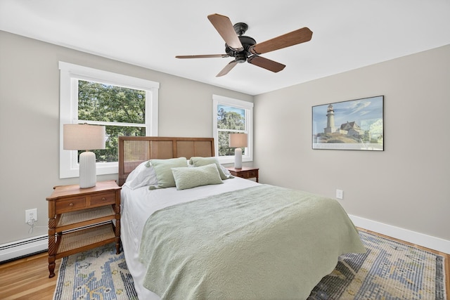 44 Squirrel, Eastham, MA 02642 - bedroom featuring wood finished floors and a ceiling fan