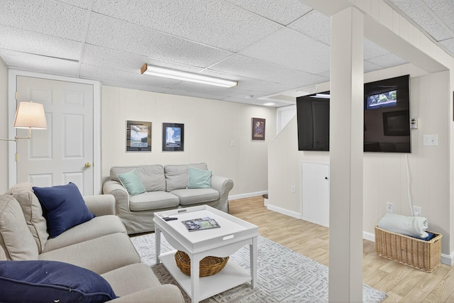 44 Squirrel, Eastham, MA 02642 - living room featuring a drop ceiling and light wood-style flooring