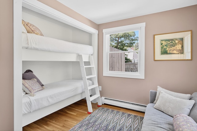 44 Squirrel, Eastham, MA 02642 - bedroom with baseboard heating and wood finished floors