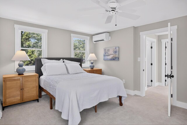 44 Squirrel, Eastham, MA 02642 - bedroom with light colored carpet, multiple windows, a wall mounted AC, and ceiling fan