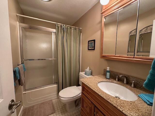 bathroom with tile patterned floors, vanity, toilet, and shower / tub combo with curtain