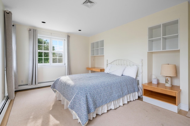 bedroom featuring carpet flooring and a baseboard radiator