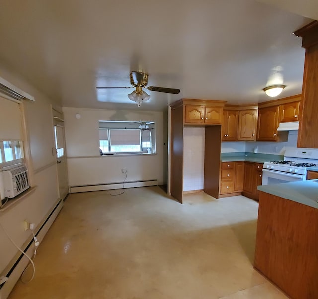 kitchen featuring ceiling fan, baseboard heating, and white range with gas cooktop