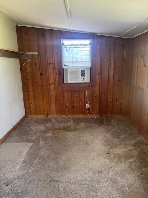 60 Baxter Ave, West Yarmouth, MA 02673 - carpeted spare room with wood walls and attic access