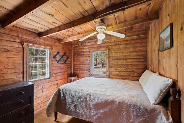 23 Pine Ridge Rd, Buzzards Bay, MA 02532 - bedroom with beamed ceiling, wooden ceiling, and wood finished floors