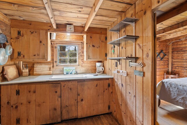 23 Pine Ridge Rd, Buzzards Bay, MA 02532 - interior space with wooden ceiling, open shelves, light countertops, and dark wood-style floors