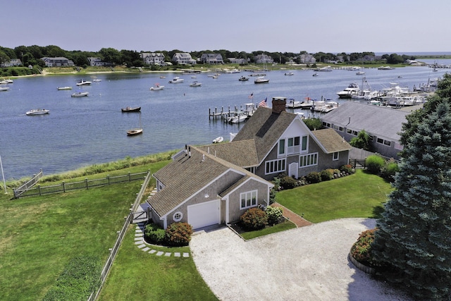 drone / aerial view with a water view